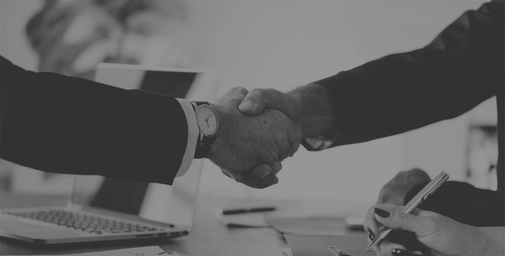 co-workers shaking hands